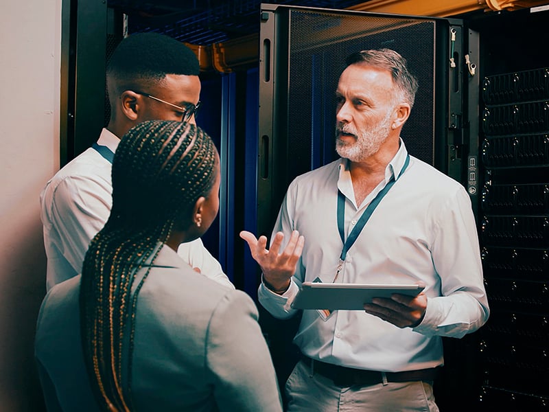 Équipe Genuine Solutions - Support informatique professionnel